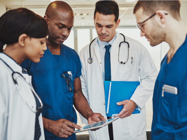 Medical professionals reviewing a patient's test results
